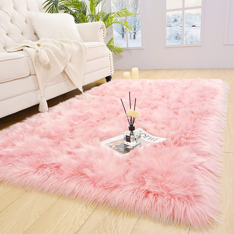 Everly Quinn Cushena Handmade Sheepskin Faux Sheepskin Pink Rug